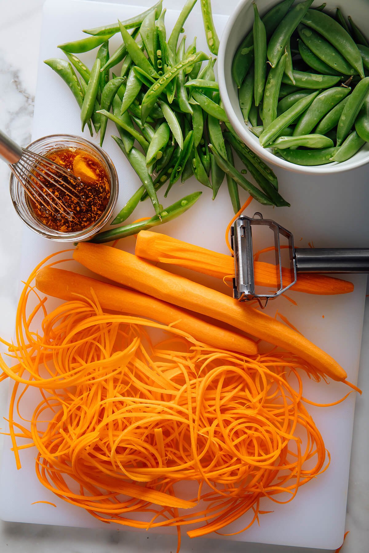 prepared carrots and sugar snap peas