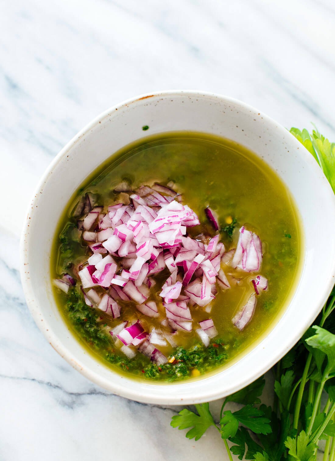 Learn how to make chimichurri sauce (traditional Argentine parsley sauce) - cookieandkate.com