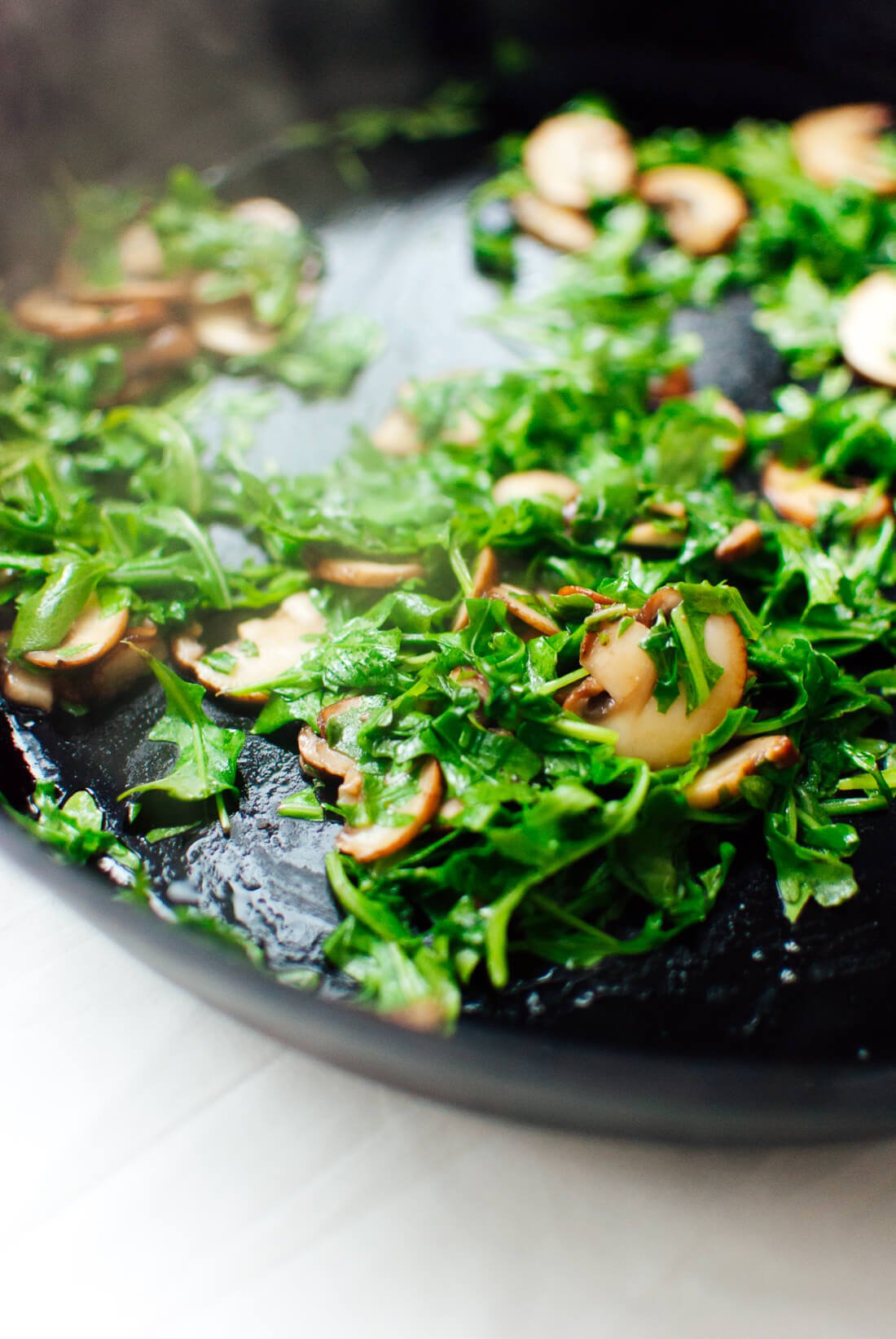 sautรฉed mushrooms and arugula